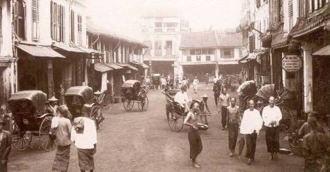 An old photograph of Singaporean shophouses, taken prior to WWII (rickshaws were banned in Singapore in 1945, after the liberation, due to health-and-safety concerns). 